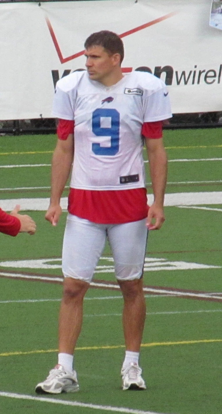 Rian Lindell standing on the field in football practice uniform